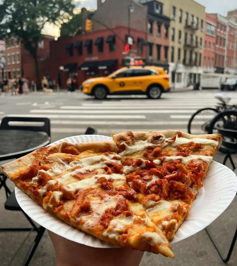 Delicious pizza with a view of Manhattan.