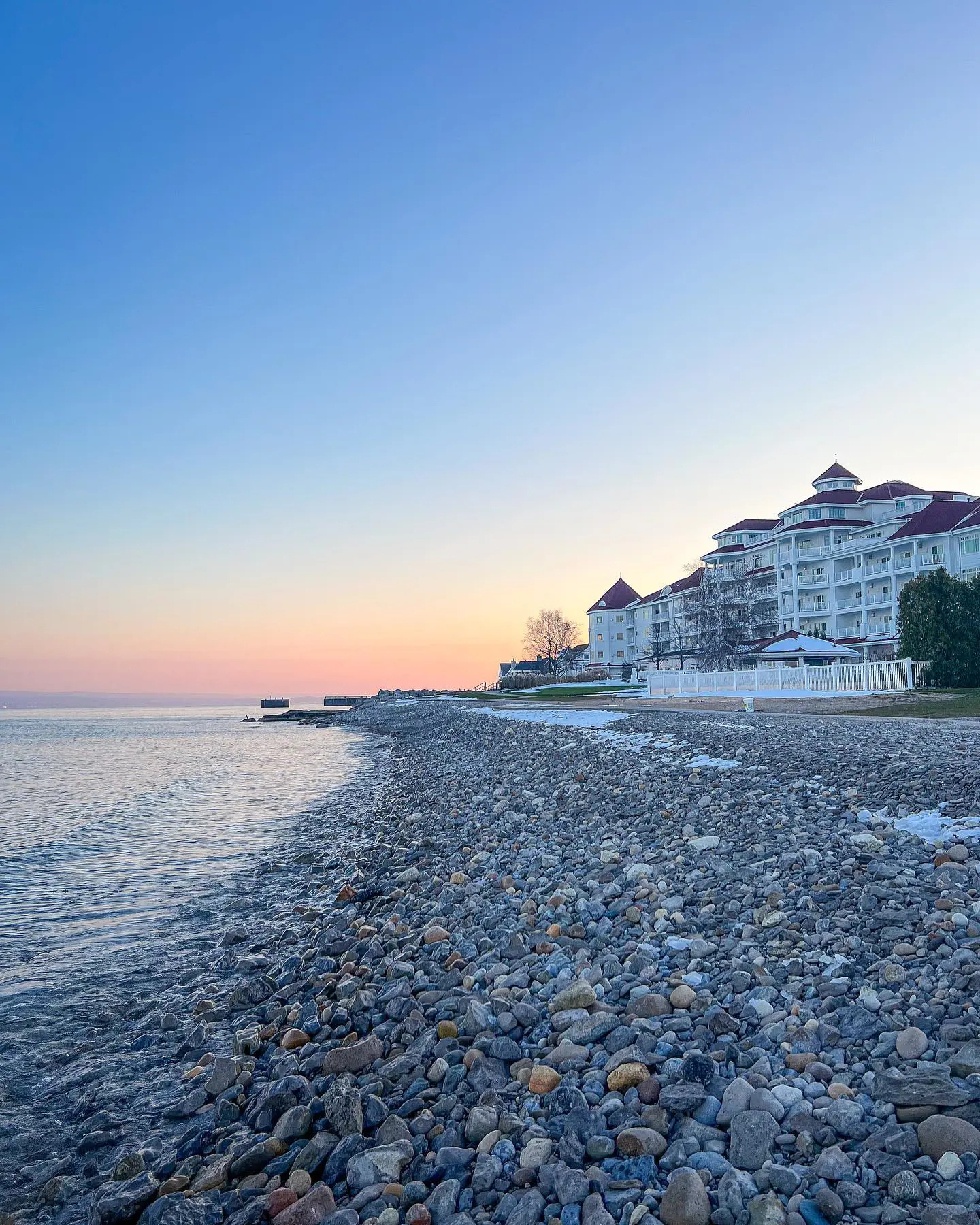 A beautiful shore view of the Inn at Bay Harbor, Autograph Collection