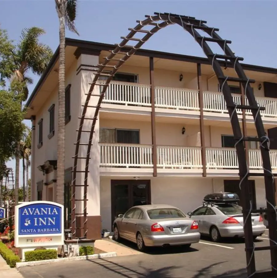 The entrance of Avania Inn of Santa Barbara with spacious parking space