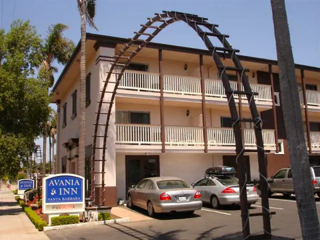 The entrance of Avania Inn of Santa Barbara with spacious parking space