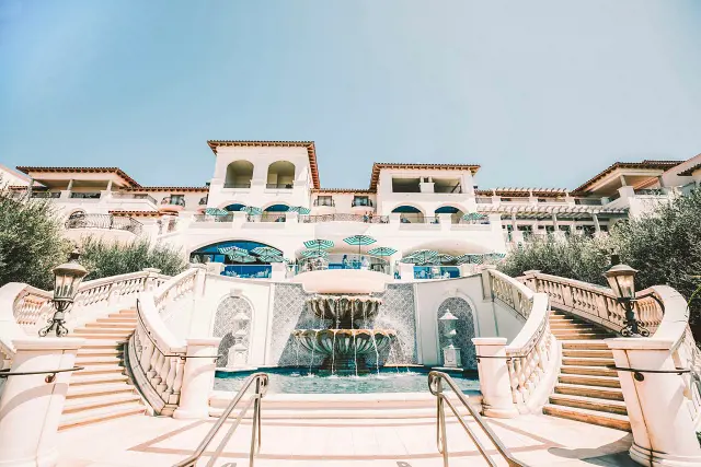 The front view of the beautiful Waldorf Astoria Monarch Beach R&C with the iconic fountain