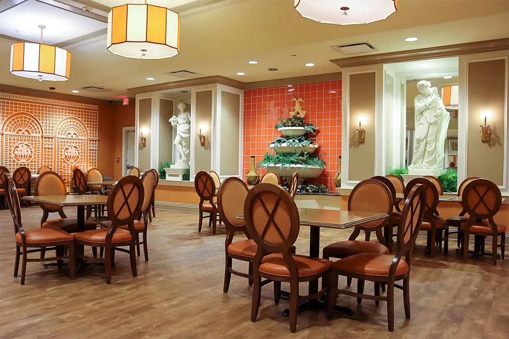 Interior of on-site Roman Garden Cafe at Villa Roman Resort.