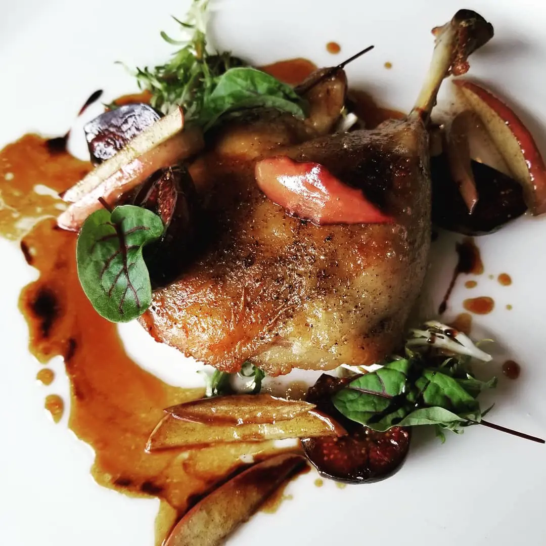 Confit Leg of Duck served with preserved figs and apples