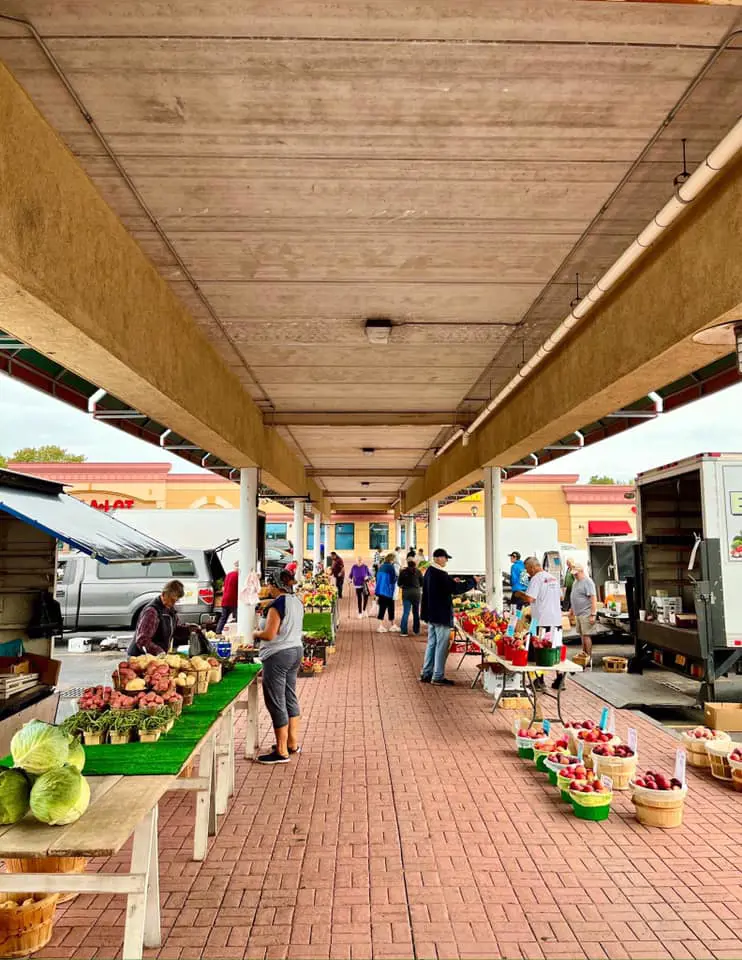 Food vendors selling fresh local products at Niagara Falls City Market